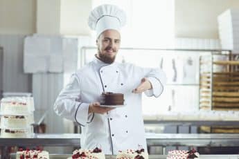 Skilled chocolatier creating premium, handcrafted chocolate treats using the finest ingredients, perfect for gifting, events, and indulging in sweet luxury.